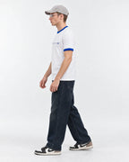 7×7=49 Ringer Tee — side view on model