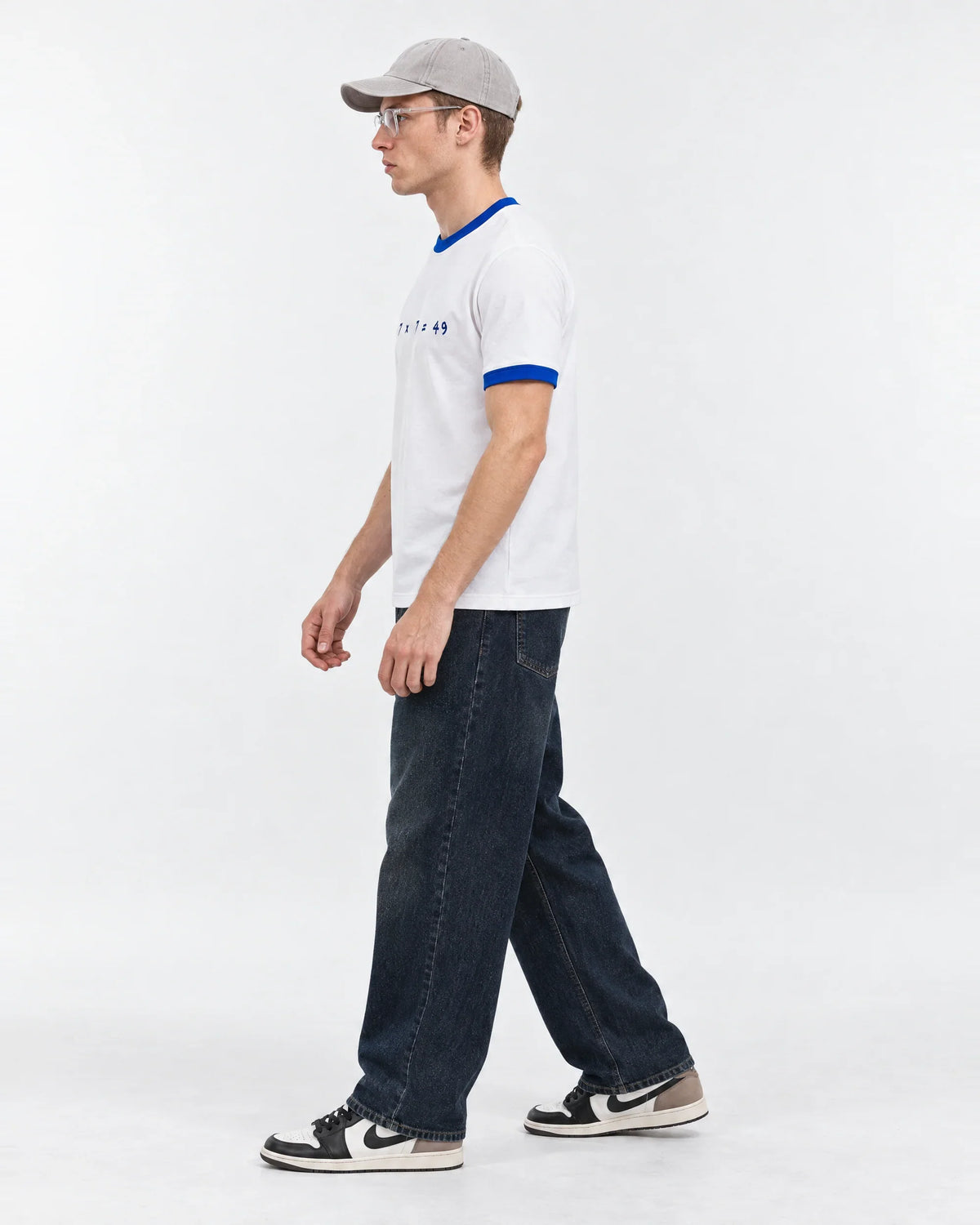 7×7=49 Ringer Tee — side view on model