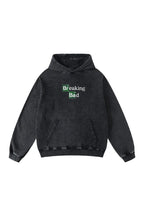 Breaking Bad Toxic Ascension acid wash hoodie by Jnorss, featuring a distressed design and casual fit on a model.
