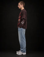 Arthur Morgan Wanted Long Sleeve Acid Wash Tee — side view on model showing layered sleeves