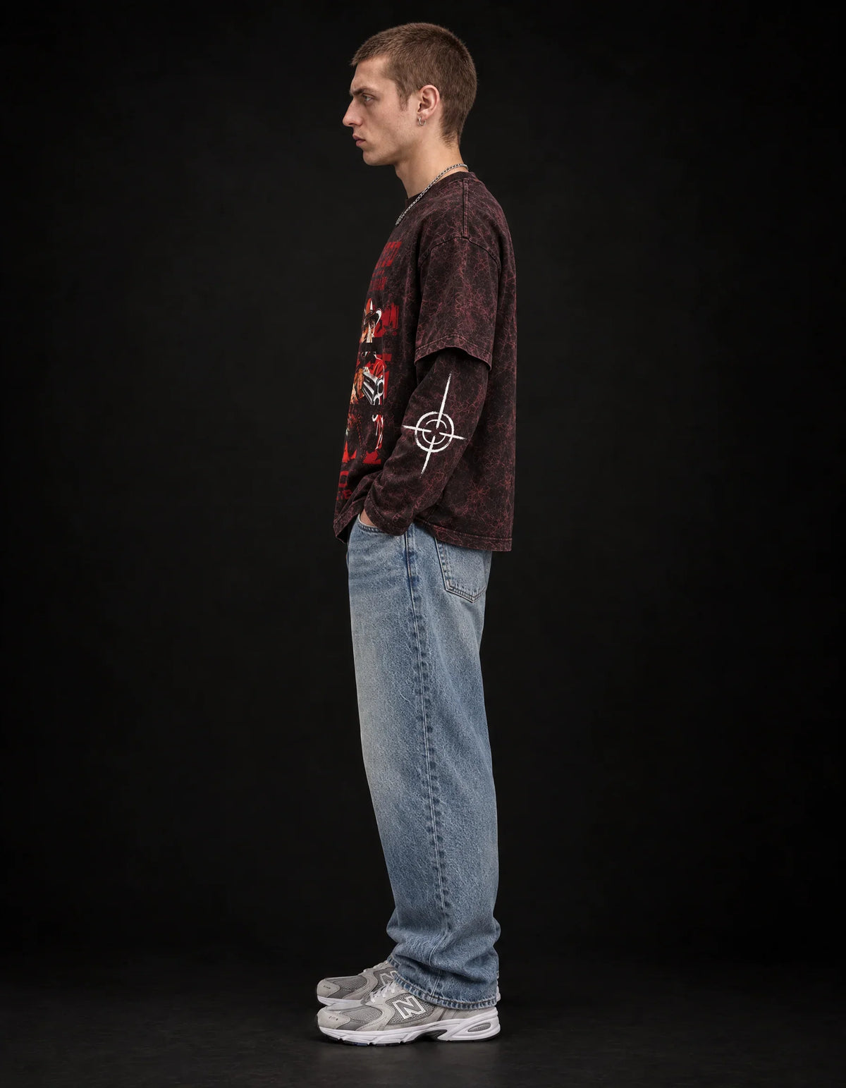 Arthur Morgan Wanted Long Sleeve Acid Wash Tee — side view on model showing layered sleeves