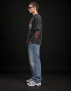 KORN Issues Acid Wash Layered Sleeve Oversized T-Shirt — side view on model showing layered sleeves