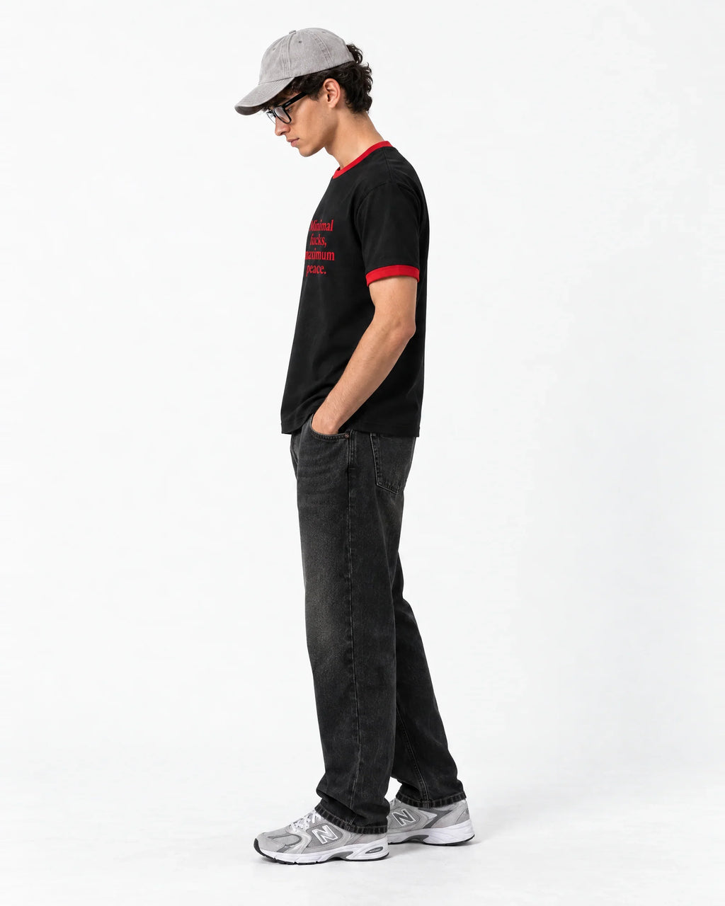 Minimal F*cks, Maximum Peace Ringer Tee — side view on model